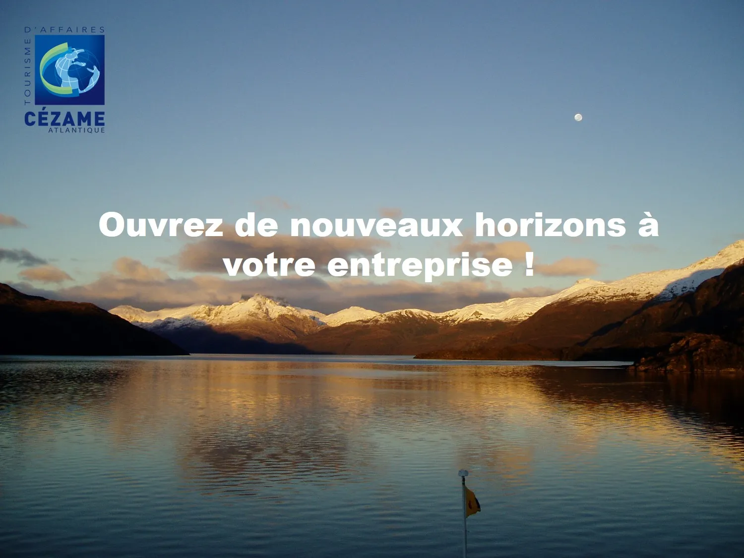 Scenic mountain lake landscape with snow-capped peaks at sunset, featuring Cézame Atlantique logo and tagline 'Open new horizons for your business'