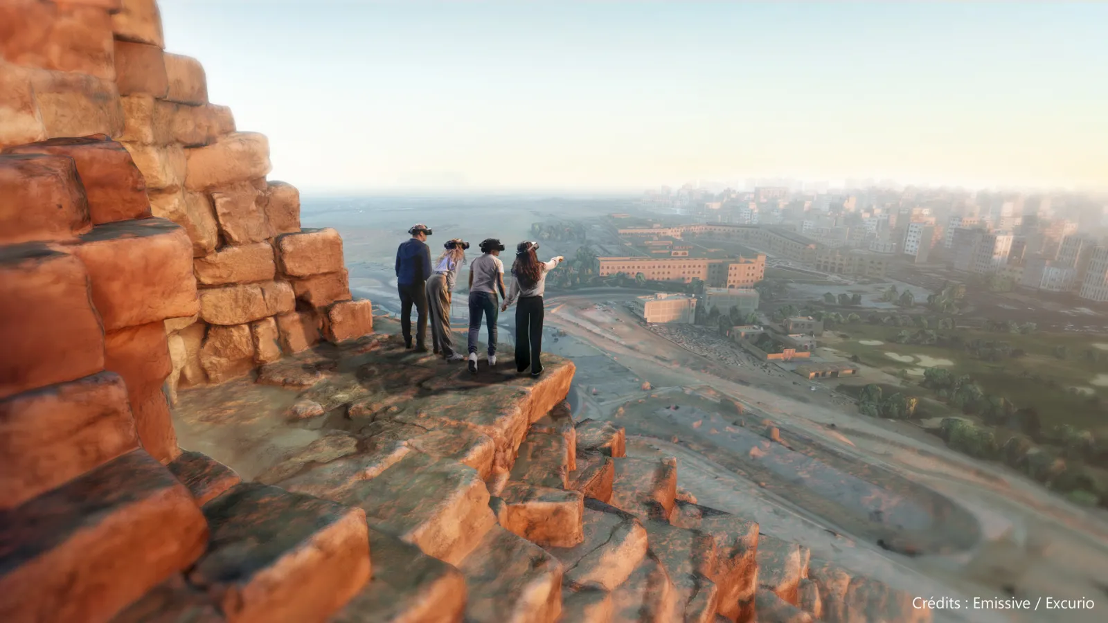 Four tourists standing on red brick fortifications overlooking the Bordeaux cityscape and river valley below on a misty morning